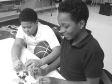 Kids Count STEM Club Students doing Science